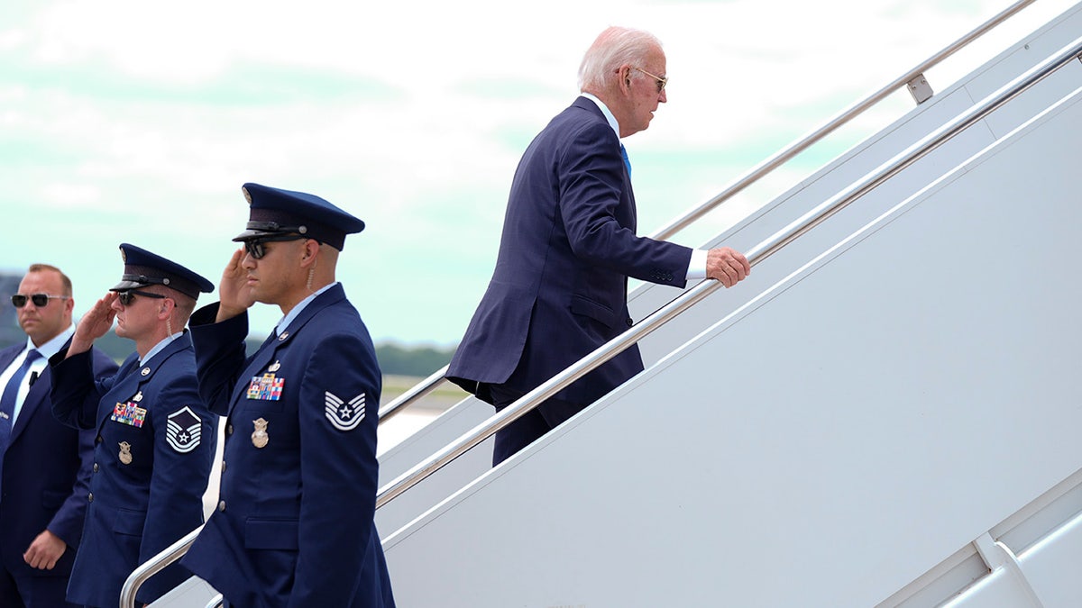 President Joe Biden boards Air Force One at Dover Air Force Base