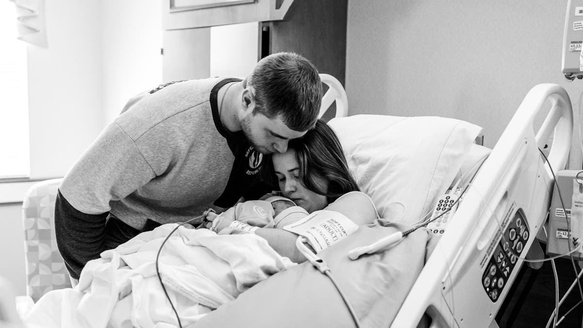 Breana and Matthew Dell with babies