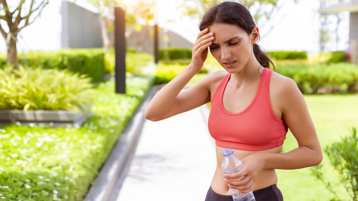 Woman having heat stroke