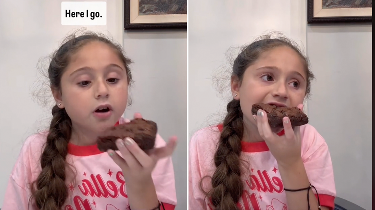 hannah taking a bite of a brownie in a tiktok video