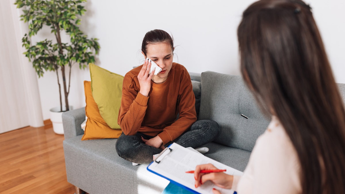 Teen girl at therapist