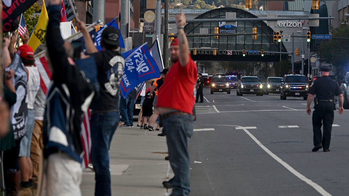 Trump supporters turn their backs on Biden