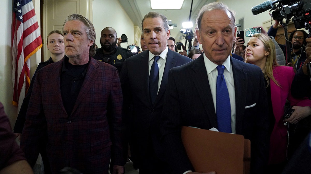 Hunter Biden, son of President Joe Biden, follows his attorney Abbe Lowell as they depart the House Rayburn Office Building following a surprise appearance